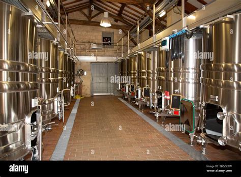 Wine factory Production in tank cellar container Stock Photo - Alamy