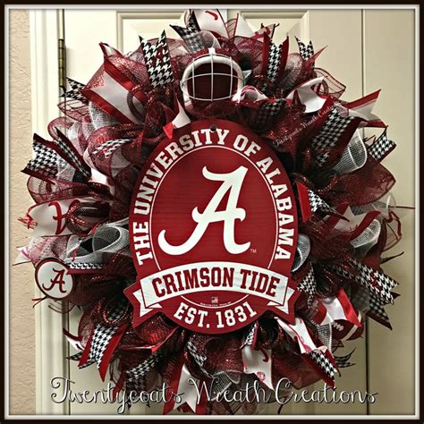 The University Of Alabama Crimson Tide Wreath Is Hanging On A Door With