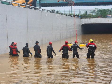 In South Korea, bodies recovered from flooded tunnel, as more than 30 killed by heavy rains; 10 ...