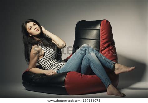 Beautiful Brunette Lying On Bean Bag Stock Photo 139186073 Shutterstock