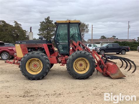 Versatile Bi Directional Wd Tractor W Grapple Loader Bigiron