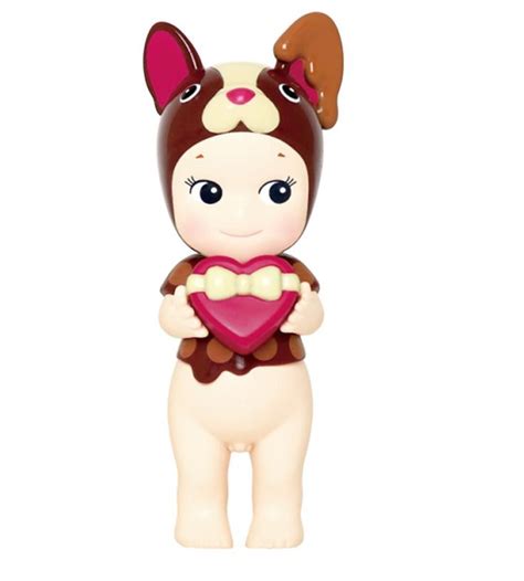 A Small Toy With A Heart On It S Chest Is Shown In Front Of A White