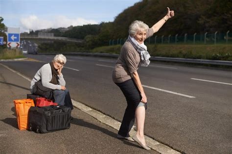 Premium Photo Women Road And Funny Hitch Hiker For Travel In Retirement Lift And Senior