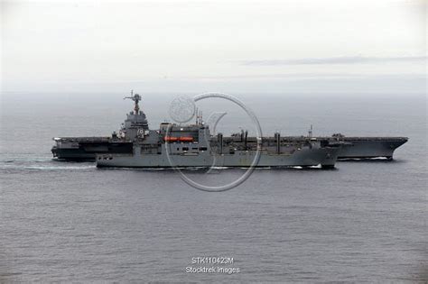 USS Gerald R. Ford pulls alongside the dry cargo and ammunition ship ...