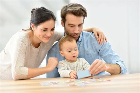 Parents with Their Baby Enjoying Playing Together Stock Photo - Image ...