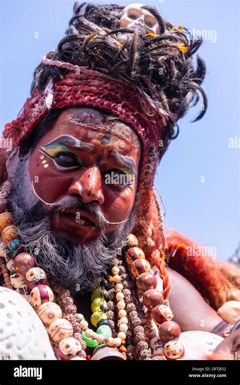 Masan Holi, Portrait of an male artist with painted face act as lord ...