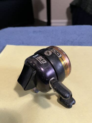 Vintage Zebco Spin Casting Reel Gold And Black Model Ebay