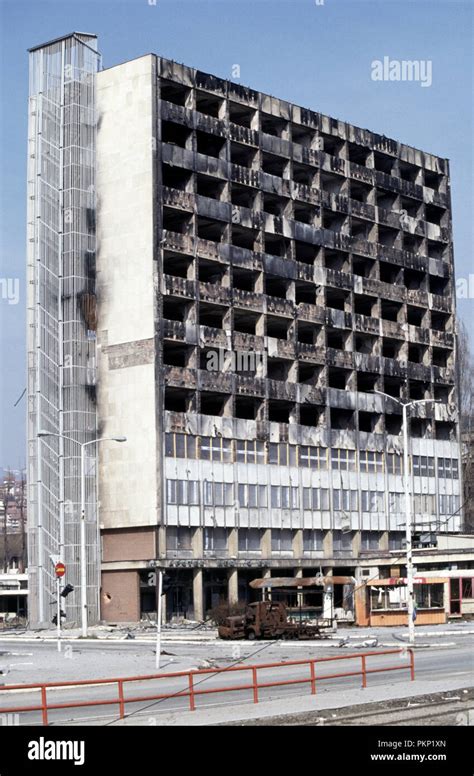 15th March 1993 During the Siege of Sarajevo: a big office block shows ...