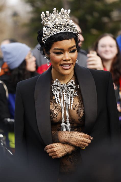Teyana Taylor goes braless under totally see-through lace dress at