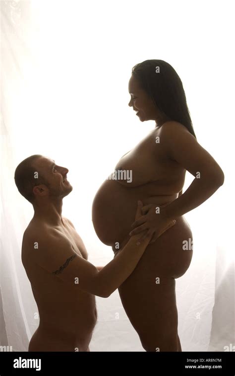 Pregnant Naked Large Woman And Partner Stock Photo Alamy