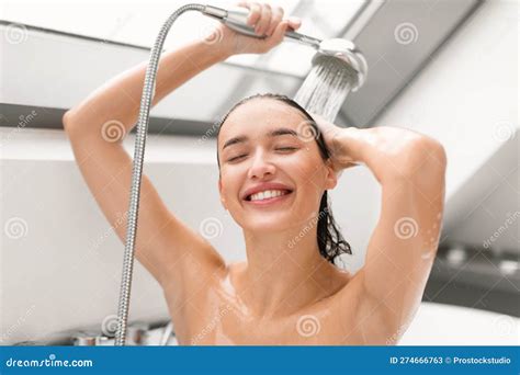 Woman Taking Shower Posing With Eyes Closed Washing Body Indoor Stock Image Image Of Caucasian