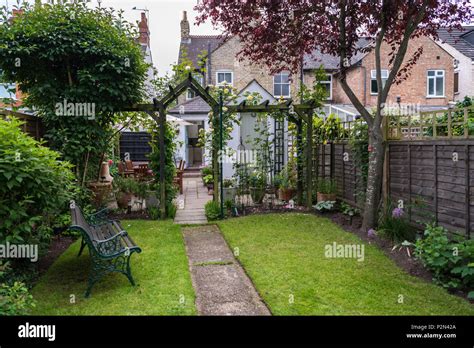 Back Garden And Patio Of A Small English Suburban House Stock Photo Alamy