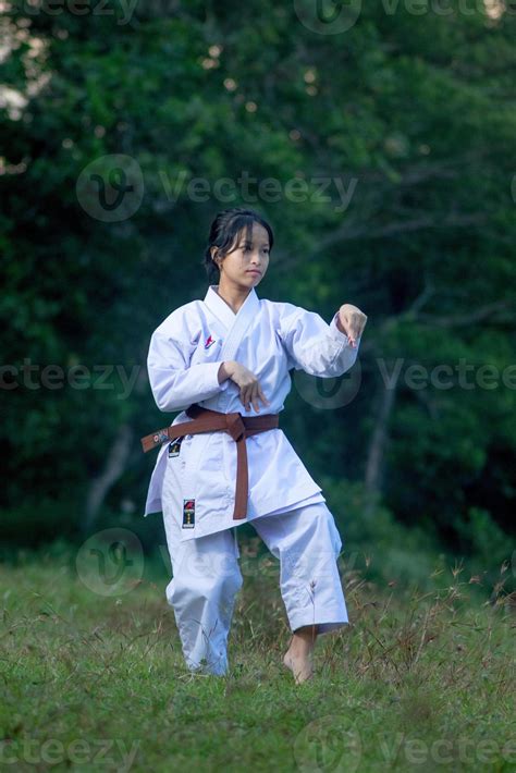 Photo Of Female Karate Person In Action Pose Outdoor Martial Art Woman