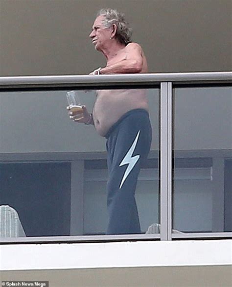 Keith Richards Goes Shirtless As He Enjoys A Drink On The Balcony