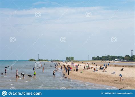 Montrose Dog Beach And Lake Michigan With People In Uptown Chicago