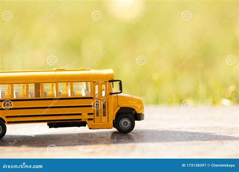 Yellow Toy School Bus on Sunny Day. Student`s Transport Stock Image ...