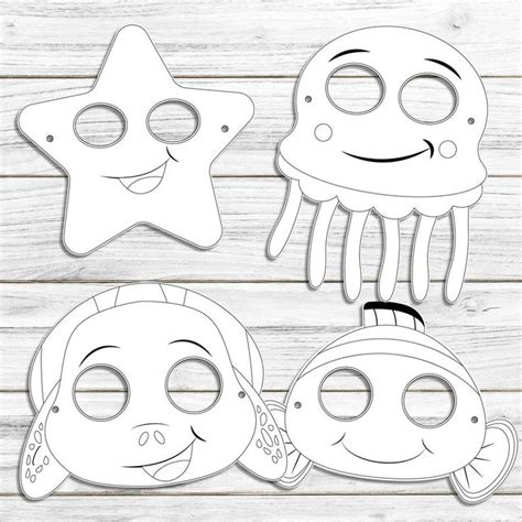 Three Paper Cut Outs With Different Shapes And Sizes Including An