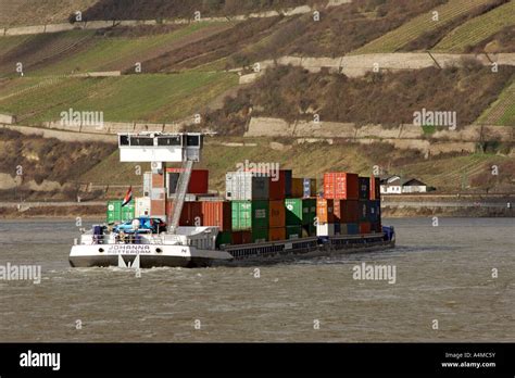 Container Ship On The Rhine River In Germany S Hessen Province Stock