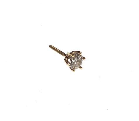 Lot 14k Yellow Gold And Diamond Stud Earring