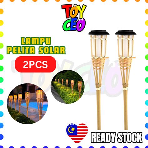 toyceo pcs lampu pelita raya led solar bamboo torch light flame