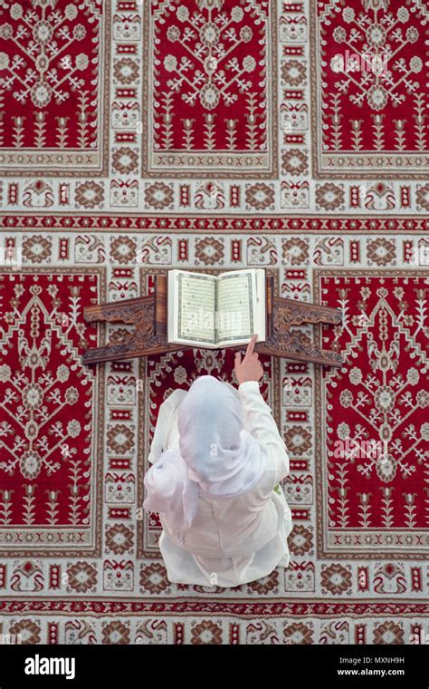 Top aerial view Young beautiful Muslim Woman Praying In Mosque Stock ...