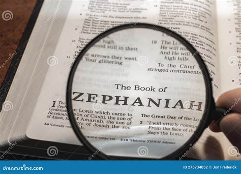 Closeup Of The Book Of Zephaniah From Bible Or Torah Using A Magnifying