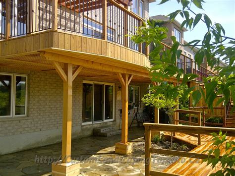 Basement Walkout Interlock With Deck And Pergola Toronto Landscaping Design And Interlock