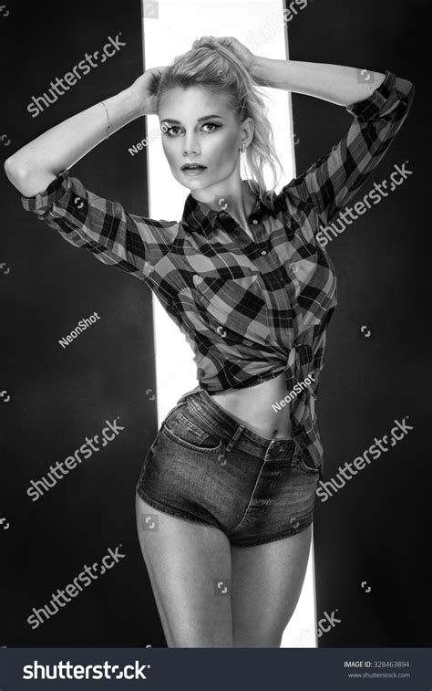Стоковая фотография 328463894 Sexy Blonde Woman Long Slim Legs Shutterstock