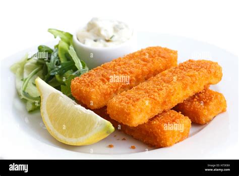 Golden Fried Fish Fingers With Lemon And Tartar Sauce Stock Photo Alamy