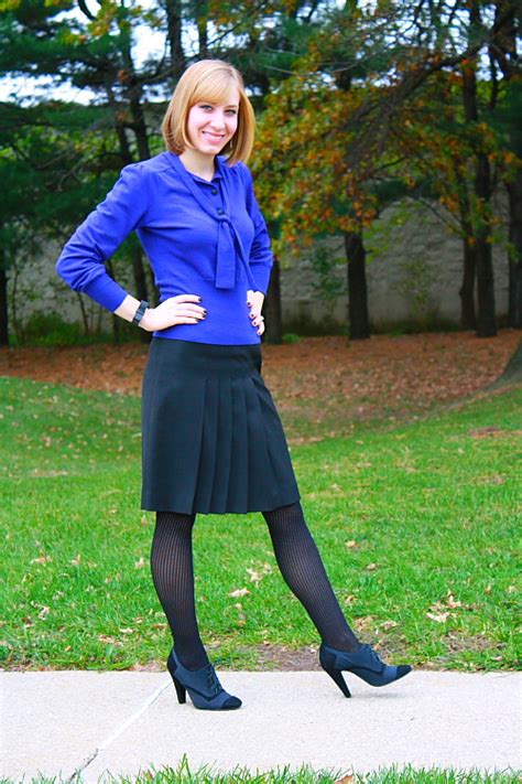 Romantic And Feminine Look In Pleated Skirt Tights And Shoes A Photo