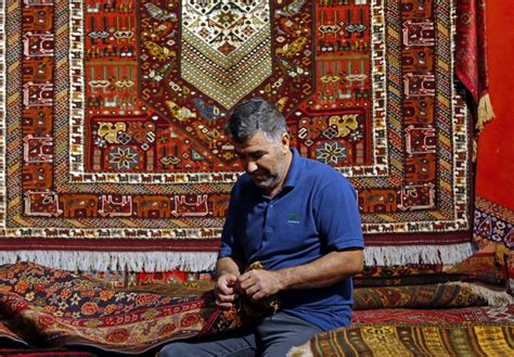 ancient iranian rug tradition  modern makeover  sinking sales