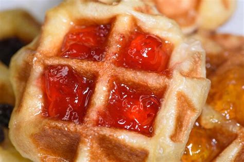 Premium Photo Close Up Fresh Waffles With Above Strawberry Jam