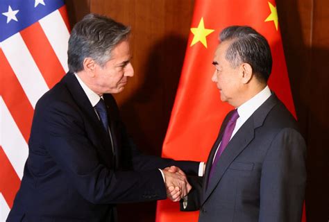 China's Wang Yi tells Blinken US should lift sanctions on Chinese firms ...