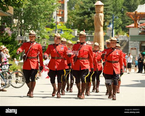 Royal Canadian Mounted Police officers in formal red serge uniforms ...