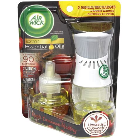 Air Wick Plug In Scented Oil Starter Kit Warmer 2 Refills Apple