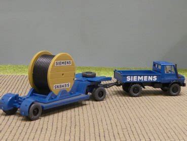 Modellspielwaren Reinhardt Wiking Unimog U Siemens Mit