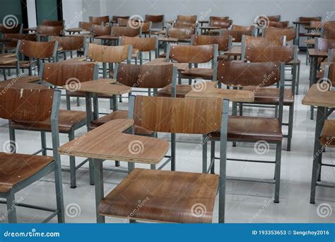 Empty School Classroom With Many Wooden Chairs Wooden Chairs In Classroom Empty Classroom With