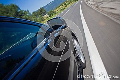 Car Driving Fast On A Road Royalty-Free Stock Photography ...