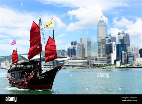 The Aqualuna Chinese Junk Boat Sailing In Victoria Harbour In Hong Kong