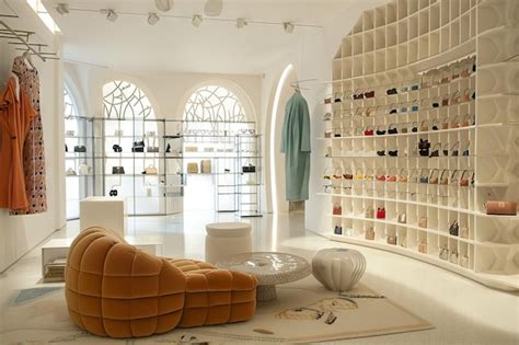 Premium Photo | Women39s boutique interior white walls paired with Molteni colors partition ...