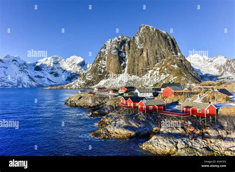 Fishing Hut Rorbu In The Hamnoy And Lilandstinden Mountain Peak In