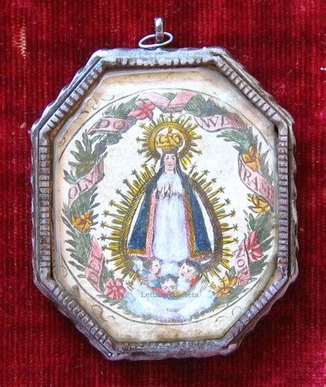 Medallón relicario con la Virgen del Olvido h 1790 Marco de hierro