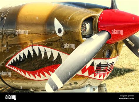 A Close Shot Of The Distinctive Shark Teeth Paint Warhawk Aircraft At