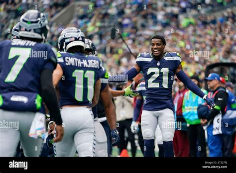 Seattle Seahawks Cornerback Devon Witherspoon 21 Celebrates A Touchdown By Seahawks Wide