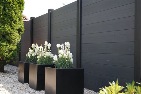 Premier Fence Co.: Fence Trends for 2015: Black Wood Fencing