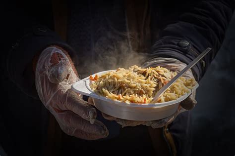 Food for the Homeless. Street Food Stock Photo - Image of giving, hands ...