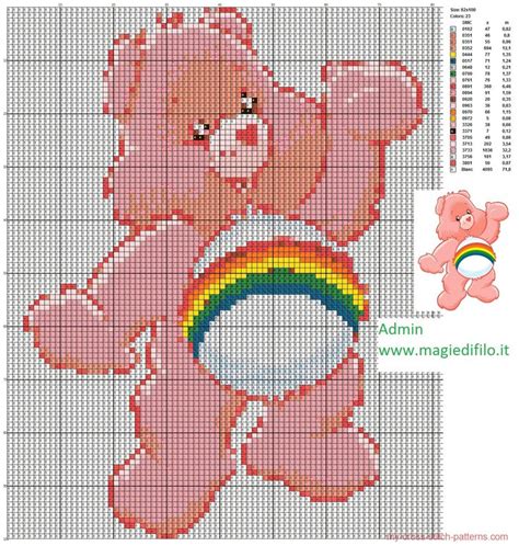 A Cross Stitch Teddy Bear Holding A Rainbow