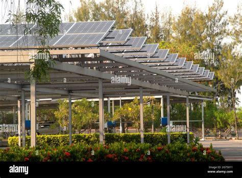 Solar Power Panels Installed On The Roof Of The Parking Lot Which Is