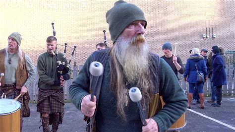 Scottish tribal pipes and drums group performs live in Scotland