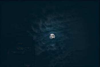 moon surface craters space night sky dark astronomy gray